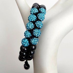 Graphite and blue beaded lariat style closure bracelet